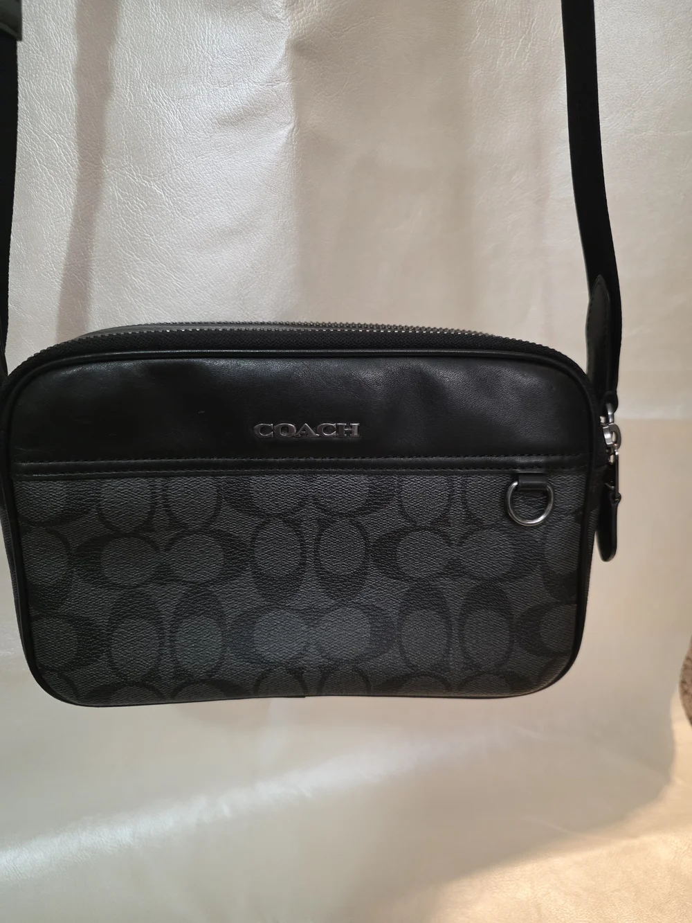 Coach Graham Crossbody bag in Charcoal Black signature coated canvas.